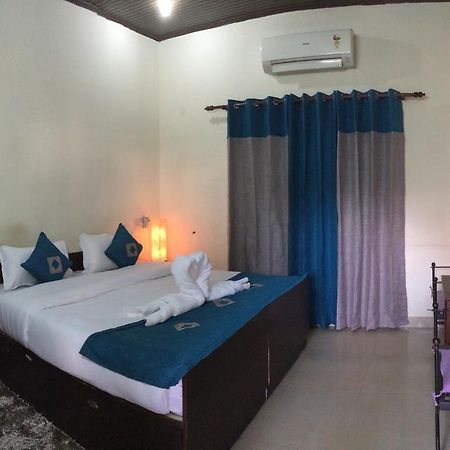 دهرادون Hotel Sukhsadan الغرفة الصورة